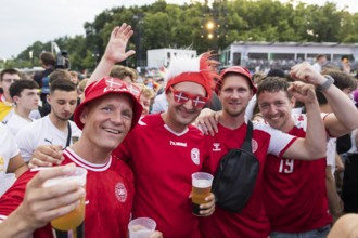 Danish fans in the fan zone at the Brandenburg Tor during the round of 16 match between Germany and