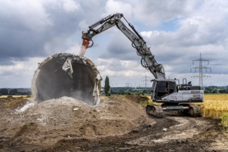 Demolished tower of a 20 year old wind turbine, in the Werl wind farm, 5 old Enercon E-66 turbines