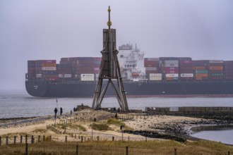 Thick fog in winter, hangs over the mouth of the Elbe into the North Sea, sea mark and landmark