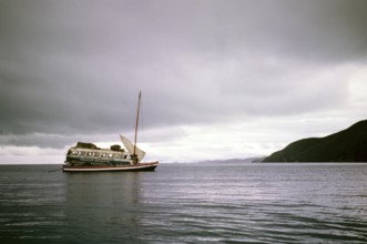 Morales Mofalito's bus on the ferry crossing Lake Titicaca, Bolivia, South America, 1962 the Strait