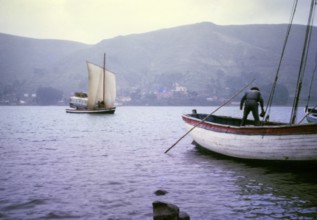 Morales Mofalito's bus on the ferry across Lake Titicaca, Bolivia, South America, 1962, arrival