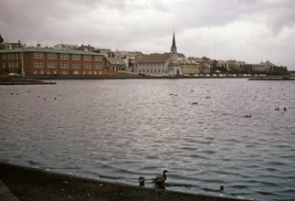 Historic buildings around Frikirkja Church, Lake Tjornin, Reykjavík, Iceland 1972