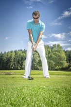 A picture of a young male golfer