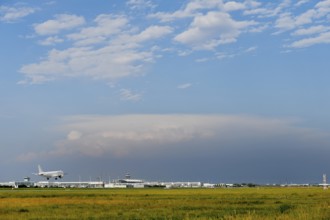 Overview Munich Airport with Runway South with thundercloud, storm cloud, rain cloud, storm, Munich