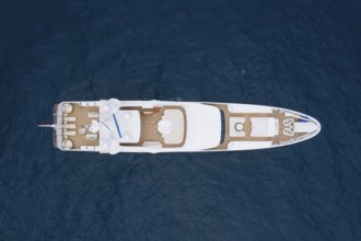 Aerial view motor yacht in front of the Principality of Monaco, French Riviera, Mediterranean Sea