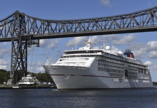 Cruise ship Europa 2 passes through the railway bridge in the Kiel Canal in Rendsburg, Kiel Canal,