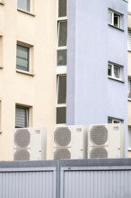 Heat pumps in a residential area, multi-family houses are supplied with heating, cooling and