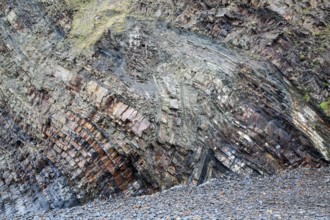 Complex folding of sedimentary rock strata in coastal cliffs at Hartland Quay, north Devon,