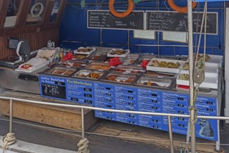 Fish sale directly from a fishing boat, Am Hafen, Wismar, Mecklenburg-Vorpommern, Germany, Europe