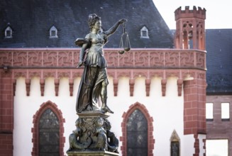 Justitia, Roman goddess of justice. Römerberg, city centre of Frankfurt am Main, Hesse, Germany,