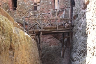 Rock churches of Lalibela, path between the rock churches, wooden bridge, wooden footbridge,