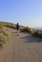 Woman walking Rodalquilar, Cabo de Gata natural park, Almeria, Spain, Europe