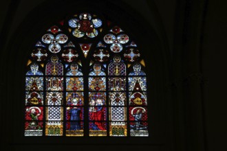 Church window with Mary, Jesus and knight figures, interior view, arts and crafts, stained glass,