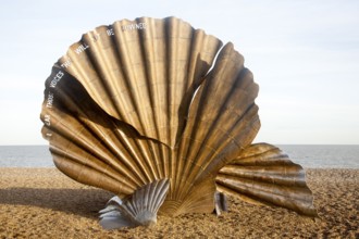 Scallop sculpture by artist Maggi Hambling, on shingle beach at Aldeburgh, Suffolk, England, United