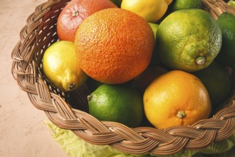 Assortment, citrus fruits, in a basket, close-up, top view, no people