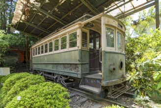 Disused tram car carriage in South Garden of Heian-jingu Shrine, Kyoto, Japan, Asia