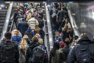 Public transport, underground, main station exit, many people crowding out of the underground