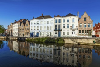 View of Bruges canal and old historic houses of medieval architecture. Brugge, Belgium, Europe