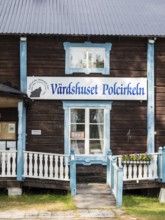 Wooden roadhouse, traditional timber style, at the Arctic circle, road E10, Sweden, Europe