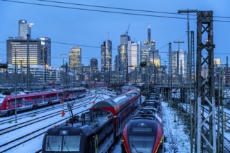 Railway tracks in front of the main railway station in Frankfurt am Main, skyline of skyscrapers in