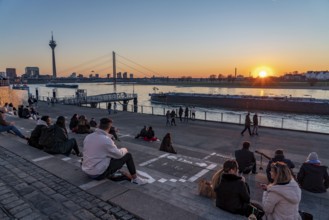 Rhine promenade, Rhine bank at the old town of Düsseldorf, stairs at the castle tower,