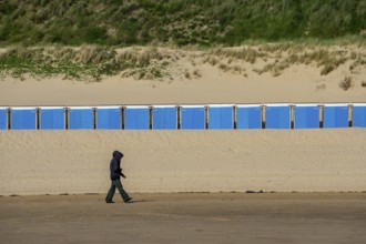 Beach cabins on the North Sea beach near Zoutelande, Zeeland, at low tide, dunes, Netherlands