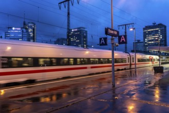 ICE train, train traffic, city centre skyline, Essen central station, North Rhine-Westphalia,