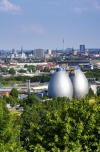 View of Dortmund city centre from the Deusenberg spoil tip, with the digestion towers of the Deusen