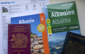 Guidebook map passports hotel booking for holiday tourist trip to Albania