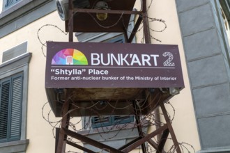 Sign for Bunk'art 2 former anti-nuclear bunker in city centre of Shtylla Place, Tirana, Albania,