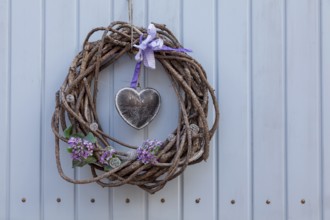 Door wreath with heart, Rhineland-Palatinate, Germany, Europe