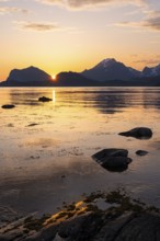 Landscape on the Lofoten Islands. View from Flakstadoya to Vestvagoya, with the snow-covered