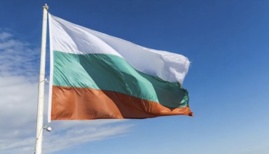 Flags, the national flag of Bulgaria flutters in the wind