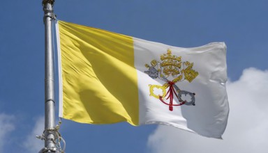 Flags, the national flag of the Vatican, Vatican State fluttering in the wind