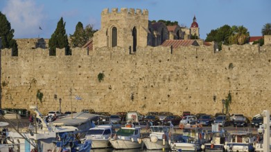 Historic city wall, tower, boats, harbour area, Rhodes town, Rhodes, Dodecanese, Greek islands,