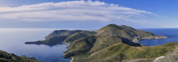 Wide panoramic view of a hilly island chain with clear blue sea, southern tip, Mani peninsula,