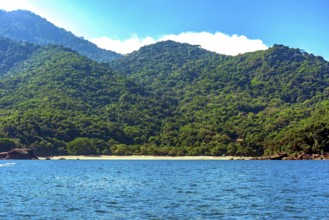 Arrival at Indaiauba beach on the island of Ilhabela seen from the sea, Indaiauba beach, Ilhabela,