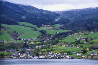 Mountains and Fjord over Norwegian Village, Olden, Innvikfjorden, Norway, Europe