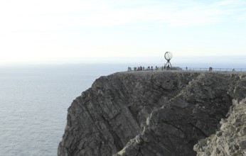 North Cape with steel globe and visitors, Lapland, Northern Norway, Norway, Scandinavia, Europe