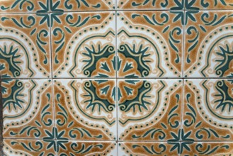 Detailed traditional tile pattern in shades of green and brown, azulejos, Portugal, Europe