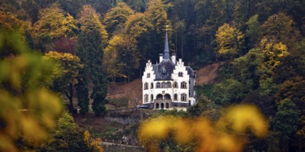 Listed, late historicist villa with stepped gable above the banks of the Rhine in autumn, Remagen,