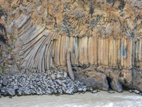 Basalt columns at waterfall Aldeyarfoss, gorge of river Skjalfandafljot, Iceland, Europe