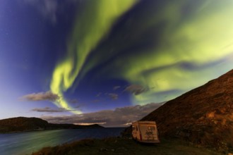 Northern Lights, (Aurora borealis) at a fjord in the Barents Sea near Bugoynes, September 2024,