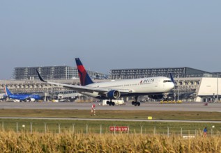 Stuttgart Airport with terminal, Delta Air Lines aircraft landing. Boeing 767-300. Stuttgart