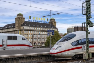 Essen main station, ICE trains on the tracks, in the background the Handelshof, city centre of