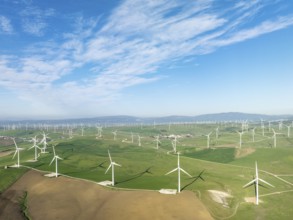 Windmills on a wind farm near Zahara de los Atunes. Aerial view. Drone shot. Cádiz province,