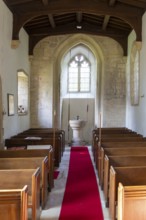 Interior view of baptismal font, church of Saint Michael, Yanworth, Gloucestershire, England, UK