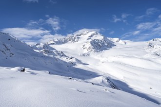 Snow-covered mountain landscape, mountain peak Monte Cevedale and glacier Zufallferner and