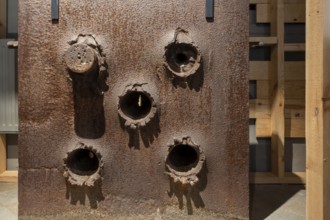 Impact of projectiles, shells on test plate to determine quality of steel for turrets at Fort van