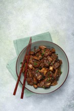 Bulgogi, with mushrooms, with sesame seeds and green onions, Korean cuisine, homemade, no people